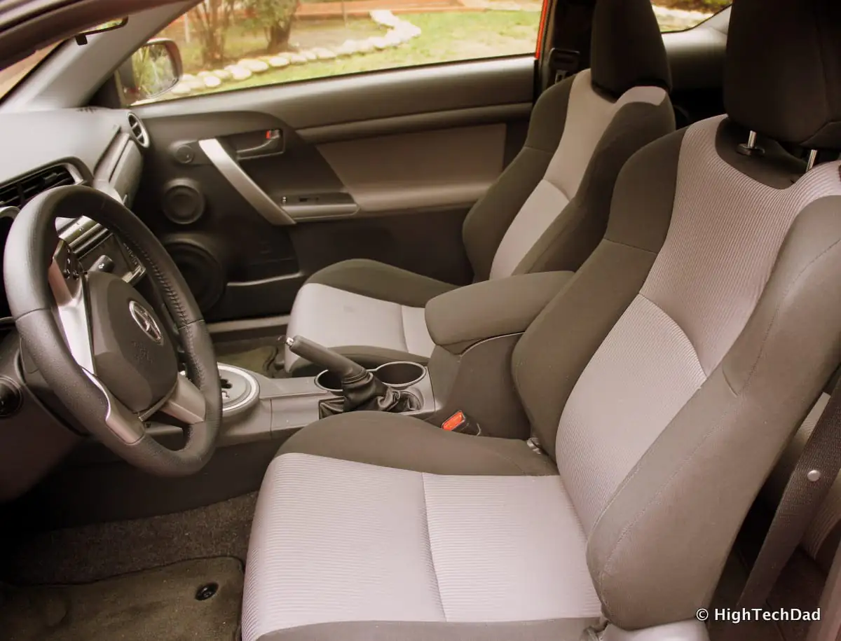 Car front seats and cabin showing seam folds where bed bugs hide